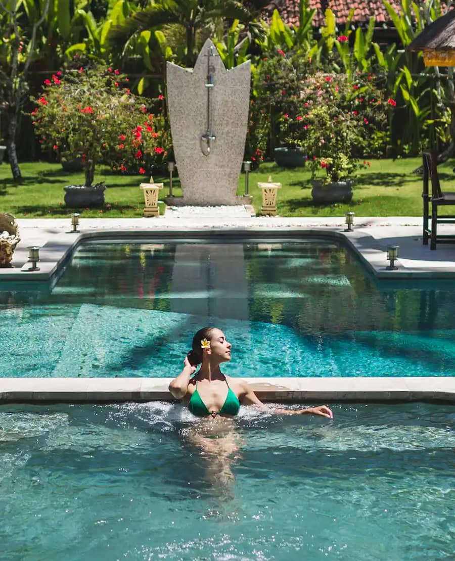 woman-in-green-swimsuit-relaxing-in-outdoor-jacuzz-new