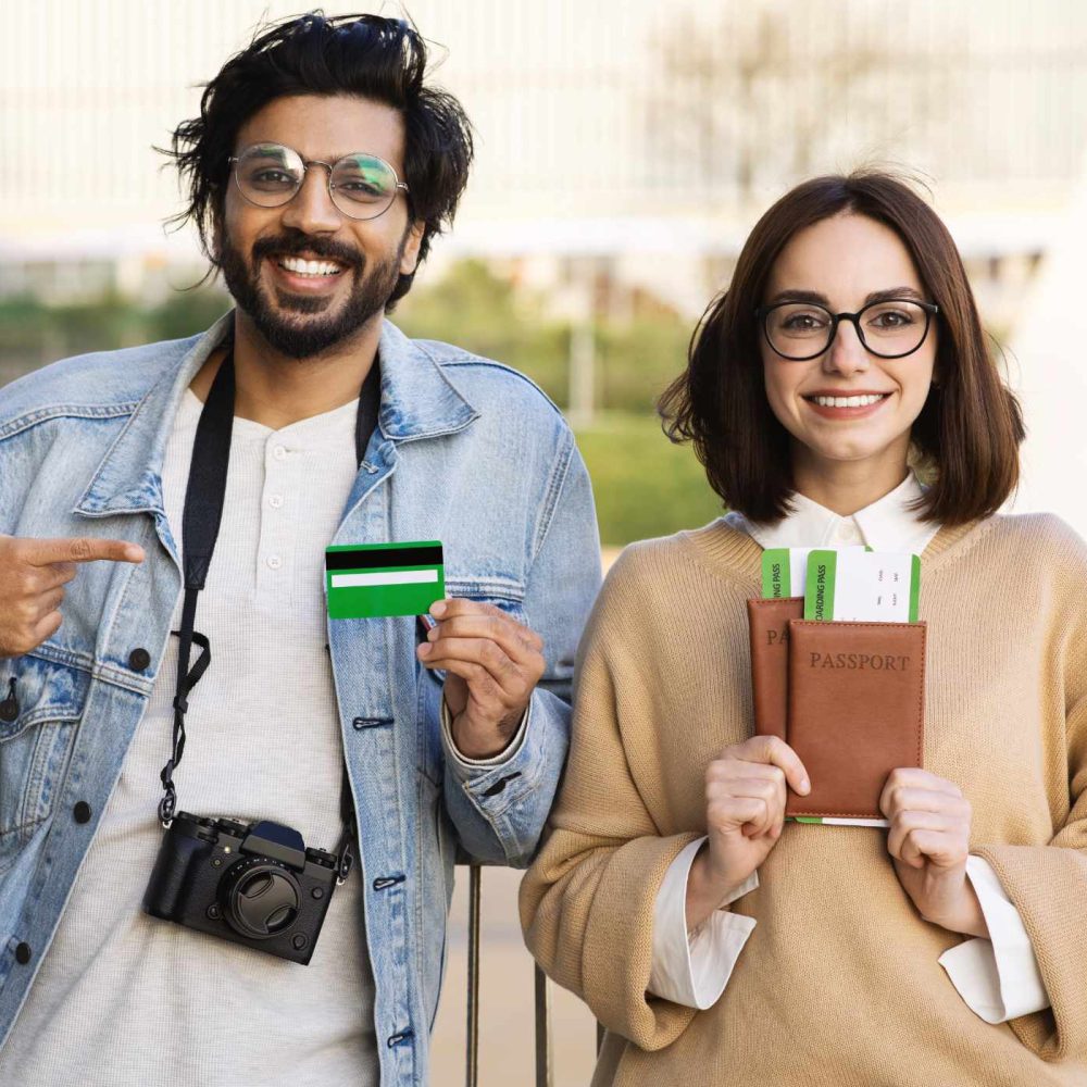 happy-smiling-young-diverse-man-and-woman-tourists-WWJZN87