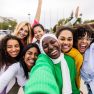 happy-young-group-of-diverse-women-taking-selfie-p-EA54BA9
