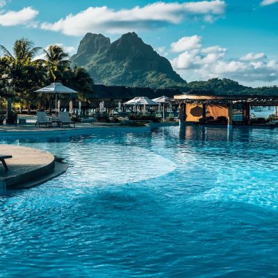 vertical-shot-of-a-resort-with-a-pool