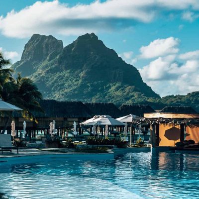 vertical-shot-of-a-resort-with-a-pool-in-bora-bora-landscape